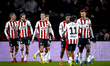 PSV Eindhoven defender Yarek Gasiorowski scores the 3-0 and celebrates the goal during the...