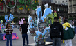 People attend the main square Zocalo to take a tour during the Nopalera in the Heart exhib...