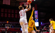 Lauryn Swann of the Rutgers Scarlet Knights attempts a two-point field goal during an NCAA...