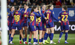 Sydney Schertenleib of FC Barcelona celebrates after scoring a goal with her teammates dur...
