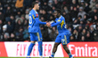 Wilfried Gnonto of Leeds United celebrates with Joel Piroe of Leeds United after scoring a...
