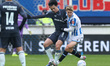 Ayase Ueda of Feyenoord Rotterdam is with Marcus Linday of SC Heerenveen during the match...