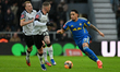 Noah Okafor of Leeds United looks to beat two Leeds United players during the Emirates FA...