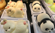 Small cakes in the shape of animals and dinosaurs are displayed without the new front-of-p...