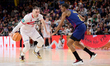 Beqa Burjanadze of Coviran Granada competes with Kevin Punter of FC Barcelona during the S...
