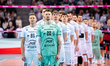 PGE Projekt Warszawa players stand during the national anthem before the volleyball match...