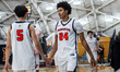 Jacob Hammond, 24, of the Princeton Tigers warms up before an NCAA men's basketball game a...