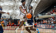 Dalen Davis (3) of the Princeton Tigers passes the ball during an NCAA men's basketball ga...