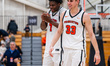 Malik Abdullahi of the Princeton Tigers and Jackson Hicke of the Princeton Tigers react du...