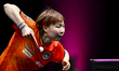 Zhu Yuling of Macao, China, competes against Chen Xingtong of China during a women's singl...