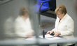 German Chancellor Angela Merkel speaks during a plenary session at Bundestag ahead of NATO...