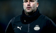 PSV Eindhoven goalkeeper trainer Kevin Begois is present during the match between FC Den B...