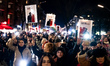 People attend a demonstration in support of Iranian protesters and ask for the fall of the...