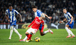 Gianluca Prestianni of SL Benfica battles for the ball with Kiwor of FC Porto during the T...