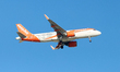 An OE-LSM EasyJet Europe Airbus A320NEO flies over the match venue during the VisitMalta W...