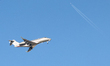 A 9H-VCM VistaJet Malta Bombardier Challenger 350 aircraft flies over the match venue duri...