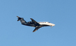 An HA-JEO Jetstream Air Cessna 650 Citation III aircraft flies over the match venue during...