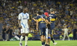 Boca Juniors supporters enter the field and take a selfie with Exequiel Zeballos from Boca...