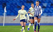 Rosa van Gool of Everton is chased by Taylor Reynolds of West Bromwich Albion during the A...