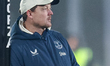 Brian Sorenson, manager of Everton, nonchalantly watches the action in the final minutes o...