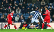 Samuel Iling-Junior of West Bromwich Albion is in defensive action as Alan Browne and Morg...