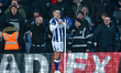 Jed Wallace of West Bromwich Albion replaces the corner flag following his goal celebratio...
