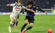 Francesco Coppola of Pisa SC and Charles De Ketelaere of Atalanta ,battle for the ball dur...