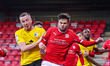 Lewis Shipley of Barrow AFC and Calum Agius of Crewe Alexandra battle in the area during t...
