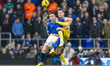 George Hirst of Ipswich Town and Sean McLoughlin of Blackburn Rovers battle for the ball d...
