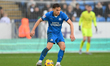 Archie Collins of Peterborough United controls the ball during the Sky Bet League 1 match...
