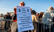 A climate activist protests against the event Tulip Day, held today at the Museumplein in...