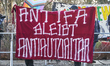 A banner reading ''Antifa bleibt antiautoritar'' (''Antifa stays anti-authoritarian'') is...
