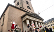 A demonstration passes by the Church of Our Lady in Copenhagen, Denmark, on January 17, 20...