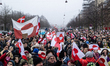 Protesters wave Greenland flags during a demonstration under the slogans 'hands off Greenl...