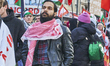 A protester participates in a Pro-Palestine demonstration in Leipzig, Saxony, on January 1...