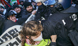 Police and protesters participate in a Pro-Palestine demonstration in Leipzig, Saxony, on...