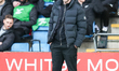 Paul Gallagher, manager of Barrow AFC, watches play during the Sky Bet League 2 match betw...