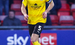 Charlie Raglan of Barrow AFC is on the ball during the Sky Bet League 2 match between Crew...
