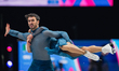 Laurence Fournier Beaudry and Guillaume Cizeron of France compete in the Ice Dance Free Da...