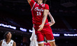 Josiah Parker (11) of the Florida Atlantic Owls goes up for a layup during an NCAA men's b...