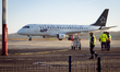 A LOT Polish Airlines Embraer ERJ-175 (reg. SP-LIO) in Star Alliance livery taxis to its p...