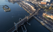 An aerial drone view shows a railway bridge and tracks leading toward Szczecin Glowny rail...
