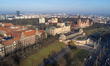 An aerial drone view shows Waly Chrobrego and the riverfront panorama in Szczecin, Poland,...