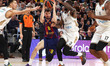 Dario Brizuela and Dwayne Bacon play during the match between FC Barcelona and Dubai Baske...
