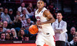 Derrian Ford (22) of the Temple Owls possesses the ball during an NCAA men's basketball ga...