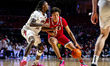 Josiah Parker (11) of the Florida Atlantic Owls drives the ball during an NCAA men's baske...