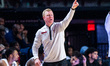 The Temple Owls assistant coach Bobby Jordan motions during an NCAA men's basketball game...