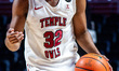 Jordan Mason (32) of the Temple Owls possesses the ball during an NCAA men's basketball ga...