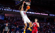 Aiden Tobiason (25) of the Temple Owls throws down a slam dunk during an NCAA men's basket...