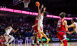 Aiden Tobiason, 25, of the Temple Owls goes up for a layup during an NCAA men's basketball...